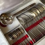 A classic vintage silver cutlery set displayed in an elegant box, perfect for fine dining.
